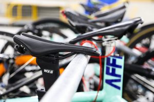 Track bicycles mounted by the seat on a bike rack