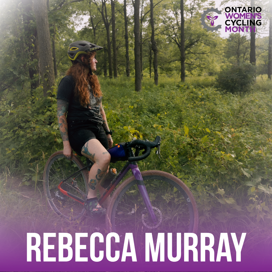Rebecca Murray posing on gravel bike in the middle of a forest trail