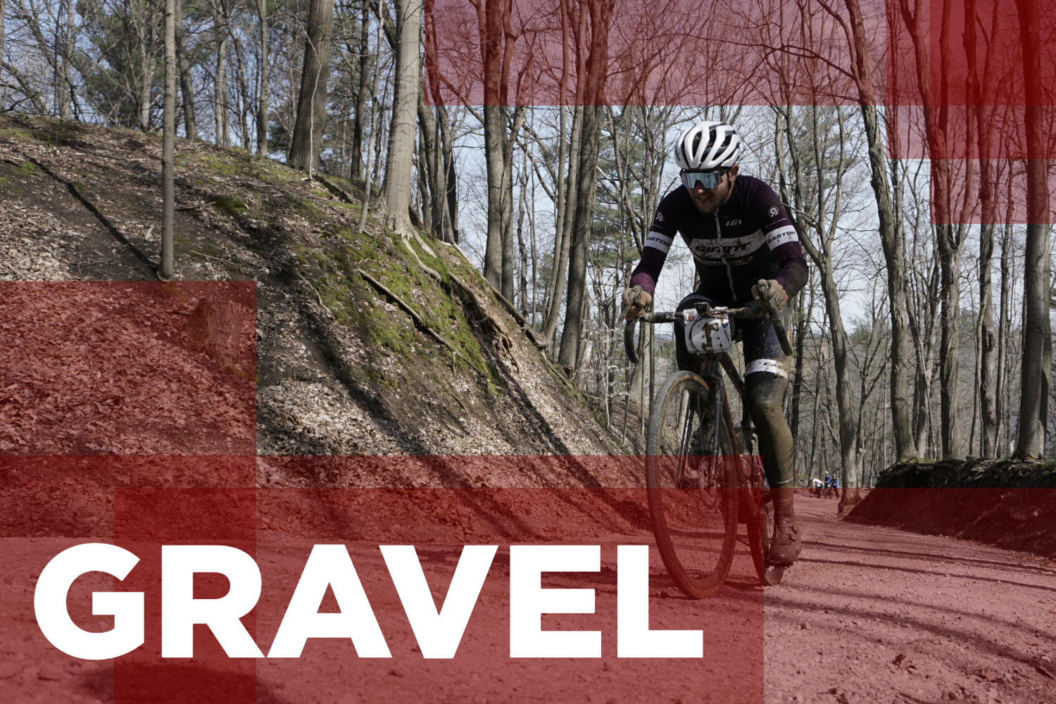 Gravel rider riding a trail in muddy racing kit text reads "gravel"