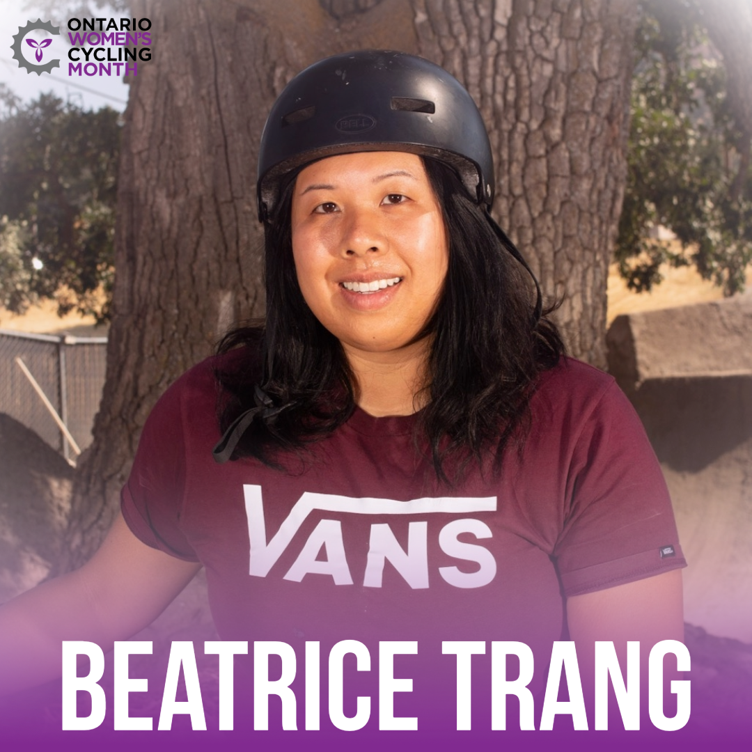 Beatrice Trang smiling in her bmx helmet and vans t-shirt